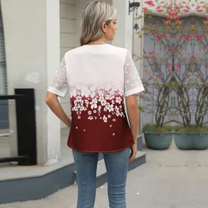 Elegant back view of women's floral chiffon top featuring lace sleeves and ombre design.