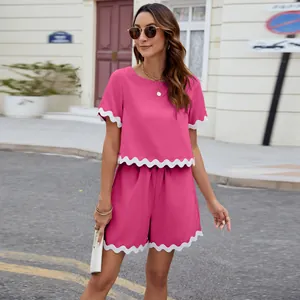 Two-piece summer set with scalloped trim top and shorts in vibrant fuchsia pink