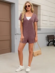 Detailed view of women's mauve ribbed knit short sleeve V-neck romper with side pockets