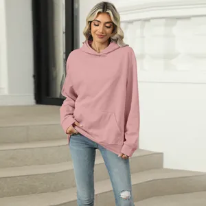 Women's casual oversized pink hooded sweatshirt with pocket detail for autumn