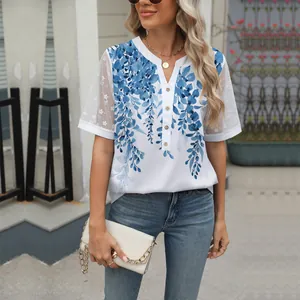 Elegant floral V-neck chiffon blouse featuring lace sleeves and button detail on model