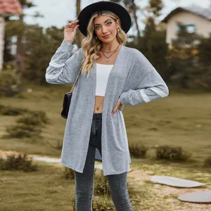 Grey knitted cardigan with white sleeve stripes for women autumn fashion detail view