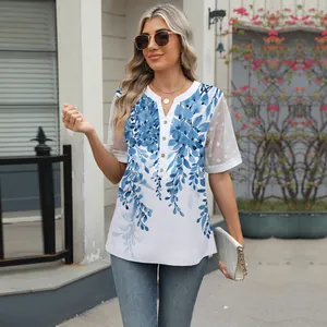 Close-up of v-neck floral print chiffon top with intricate lace sleeve details.
