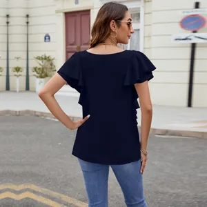 Back view of elegant navy blue flutter sleeve blouse with stylish ruffle detailing