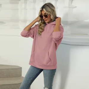 Fashionable women's casual pink hoodie with front pocket and hood detail for fall
