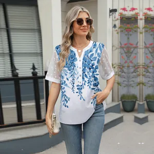 Detail view of V-neck floral chiffon top with beautiful white lace patchwork sleeves