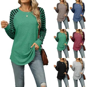 Women's crew neck long-sleeve top with striped raglan sleeves in multiple colors