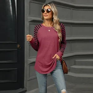 Casual women's long-sleeve T-shirt with color-block striped sleeves and swallowtail hem.