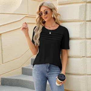 Detailed view of black U-neck t-shirt with pleated front design for women