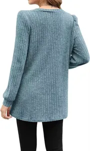 Back view of a light blue ribbed long sleeve top featuring elegant puff shoulder details