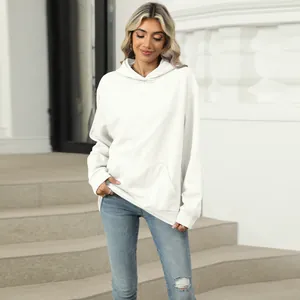 Casual oversized white hoodie for women with a functional front pocket and street style