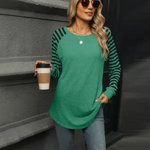 Womens green long sleeve t-shirt with striped raglan sleeves and a casual round neck design