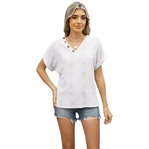 Stylish women's white jacquard V-neck T-shirt with button details and hollow eyelet pattern