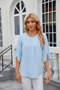 Close-up of light blue chiffon blouse featuring stylish split five-point sleeves