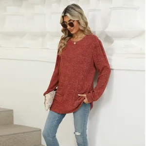 Casual brick red long sleeve ribbed top for women featuring front pockets and round neck