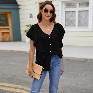 Elegant black blouse with double ruffle sleeves and white buttons for summer
