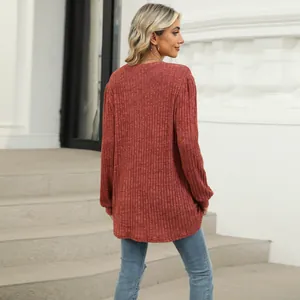 Back view of a casual brick red ribbed long sleeve top featuring stylish puff sleeves for women
