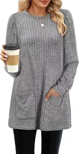 Detailed view of grey ribbed long sleeve knit tunic with puff sleeves and front pockets