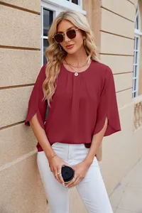 Model wearing an elegant wine red round neck chiffon blouse with unique slit half-sleeves