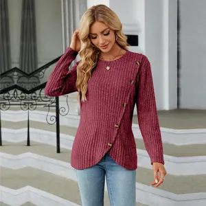 Elegant long sleeve ribbed knit top with a stylish tulip hem and button accents for women