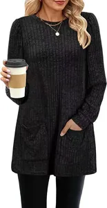 Detail of dark grey ribbed knit top with dual front pockets and cozy puff sleeves