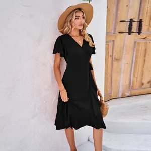 Elegant black V-neck wrap dress with ruffle hem and tie waist for stylish summer fashion.