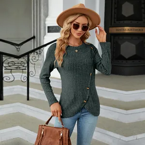 Detail view of dark green ribbed long sleeve t-shirt with side button and tulip hem