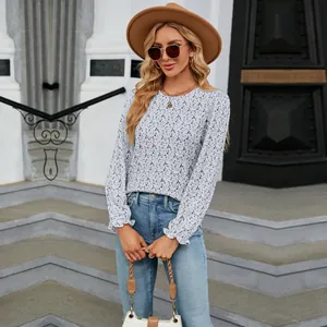Elegant women's floral long sleeve blouse with round neck and ruffled cuffs for fall