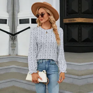 Elegant floral print long-sleeve blouse with round neck for a casual street look.