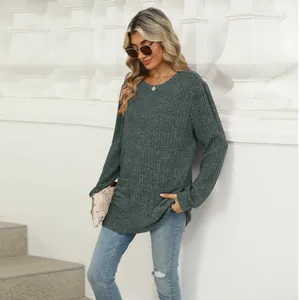 Casual charcoal grey long sleeve top with front pockets and ribbed texture detail for fall