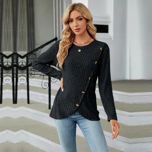 Detail shot of a black ribbed long sleeve t-shirt featuring a unique tulip hem design.