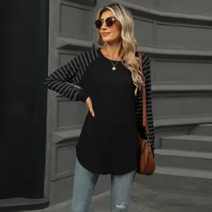 Women's stylish long sleeve t-shirt with color block striped sleeves and curved hem