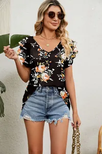 Detailed view of the floral print V-neck top with stylish double ruffle sleeves.