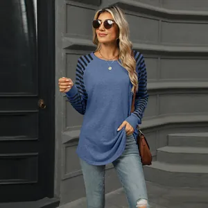 Stylish women's round neck long sleeve top with blue and black striped patchwork sleeves