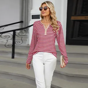 Detail of red and white striped V-neck long sleeve T-shirt for autumn winter season