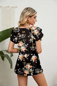 Back view of a black floral print top with double ruffle sleeves for women