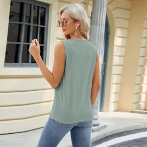 Back view of a sage green sleeveless top featuring a delicate pointelle knit pattern