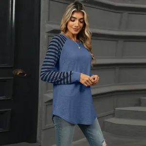 Side view of color-block striped patchwork long sleeve T-shirt with swallowtail hem