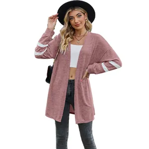 Elegant women's mauve knit cardigan featuring white sleeve stripes and open-front style.