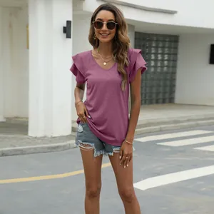 Mauve V-neck T-shirt with double-layered ruffle sleeves shown in outdoor street setting