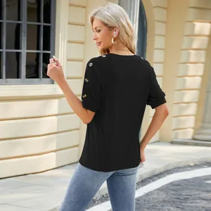 Black women's T-shirt featuring raglan sleeves with tortoiseshell button detailing on back