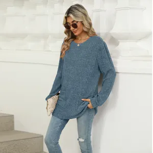 Comfortable loose-fit blue ribbed knit long sleeve top with side pockets for women's autumn style.