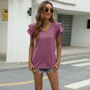 Casual mauve V-neck T-shirt with double layered ruffle sleeves worn outdoors