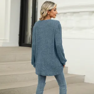 Back view of a casual blue ribbed crew neck top with bubble sleeves for women