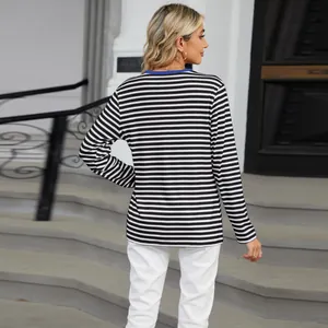 Back view of women's striped long sleeve t-shirt with a blue contrast neck detail