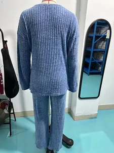 Detailed back view of a blue ribbed knit loungewear set with long sleeve top and pants
