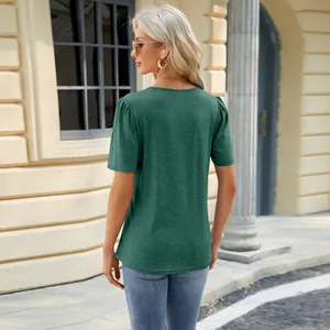 Back view of dark green short sleeve T-shirt with pleated shoulders and U-neck detail