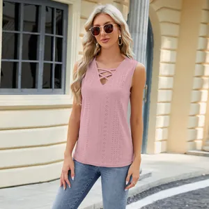 Women's pink textured jacquard sleeveless top featuring a stylish lattice V-neck design