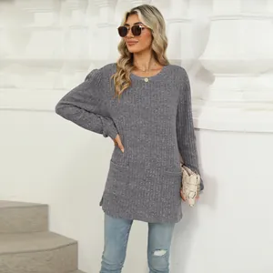Elegant grey puff sleeve knit top with side pockets and round neck for casual autumn fashion