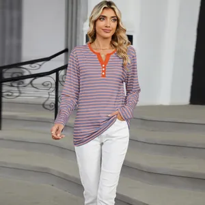 Casual women's striped long sleeve T-shirt with V-neck and button details outdoor